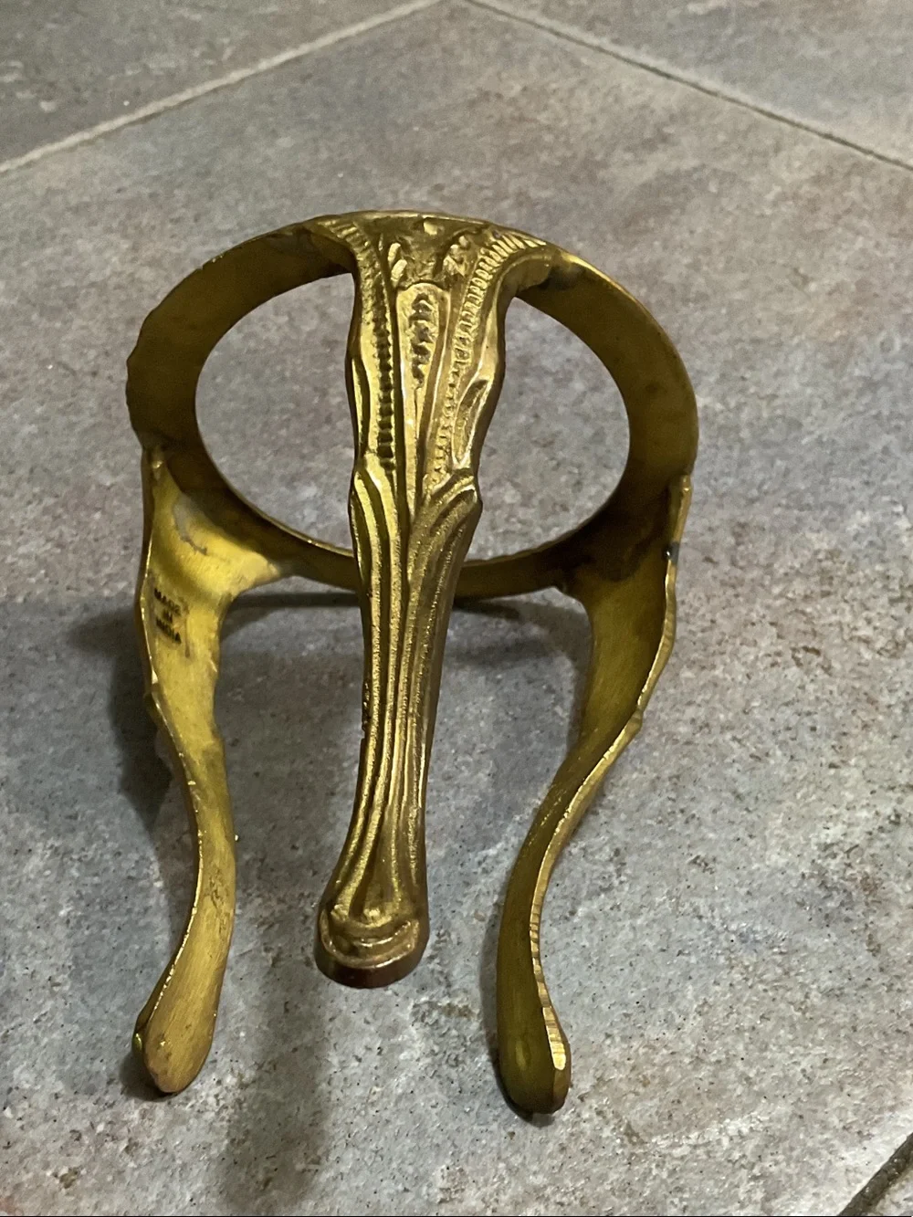 Brass candle holder with glass